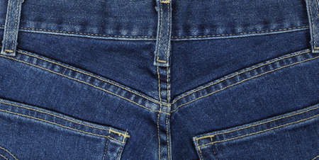 Clothes, shoes and accessories - Top view closeup fragment blue jeans pockets closeup background