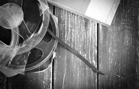 Music and sound - Top view a lot of old tapes and reels piled on a background of wooden boardsの写真素材