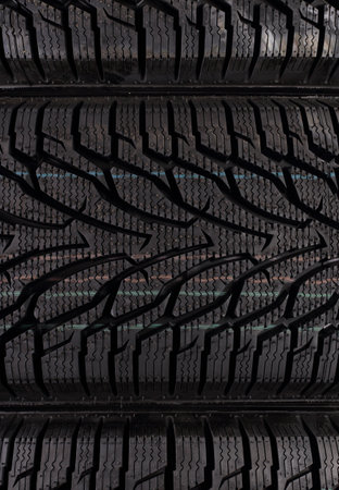 Car Parts - Closeup fragment protector new car winter three tireの写真素材