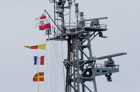 BALTIC SEA / POLAND - 2017: Signal flags and flag on the mast of the Polish warshipのeditorial素材