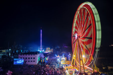 SZCZECIN, WEST POMERANIAN / POLAND: Final Tall Ships Races. Ferris wheel on the harbor quay at nightのeditorial素材