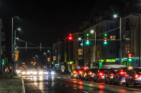 KOSZALIN, WEST POMERANIAN / POLAND: Christmas time - Evening traffic in the cityのeditorial素材