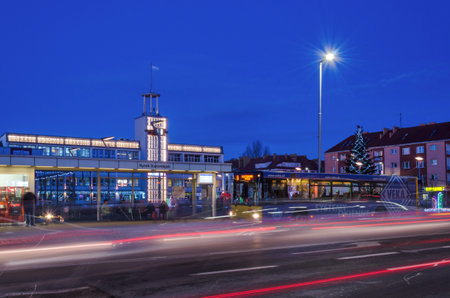 KASZALIN, WEST POMERANIAN / POLAND: The public transport bus takes the bus stop in front of the town hallのeditorial素材