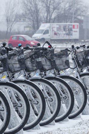 KOLOBRZEG, WEST POMERANIAN / POLAND: City bikes in the dock are waiting for usersのeditorial素材