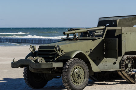 KOLOBRZEG, WEST POMERANIAN / POLAND - 2018: Reconstruction of battle for Ko?obrzeg - Armored Staff Carrier With Cannon of Polish Army is getting ready for the showのeditorial素材