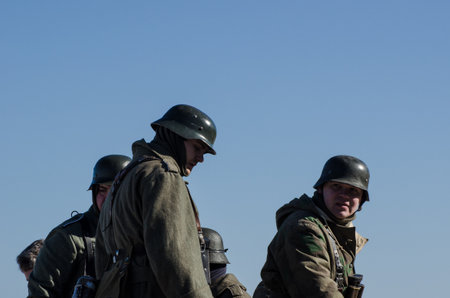 KOLOBRZEG, WEST POMERANIAN / POLAND - 2018: Reconstruction of battle for Ko?obrzeg - Reconstruction group in uniforms of Wehrmachtのeditorial素材