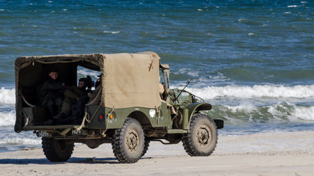 KOLOBRZEG, WEST POMERANIAN / POLAND - 2018: Reconstruction of battle for Ko?obrzeg - A small military truck with Polish soldiersのeditorial素材