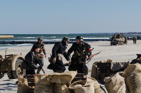 KOLOBRZEG, WEST POMERANIAN / POLAND - 2018: Reconstruction of battle for Kolobrzeg - The German defense on the barricadeのeditorial素材
