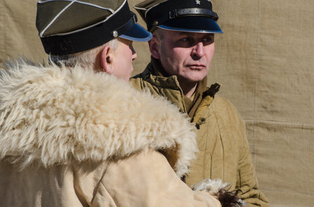 KOLOBRZEG, WEST POMERANIAN / POLAND - 2018: Reconstruction of battle for Kolobrzeg - Meeting of the officers of the Polish Army against attackのeditorial素材