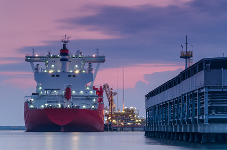 LNG TANKER - Ship at dawn moored to the gas terminalの写真素材