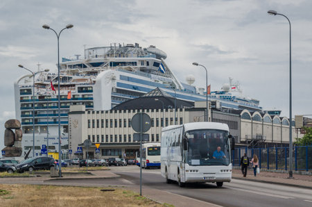 GDYNIA / POMERANIAN REGION - POLAND - 2018: Historic Passenger Sea terminal with a Museum of Emigration and Cruise Ship SAPPHIRE PRINCESS at the wharfのeditorial素材