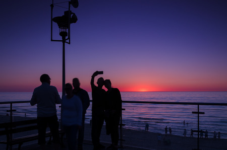 EVENING BY THE SEA - Sunset on the observation deck in the dunesの写真素材