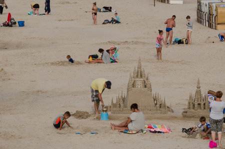 KOLOBRZEG, WEST POMERANIAN / POLAND - 2018: Sand castle - Holiday day on the Baltic Sea beachのeditorial素材