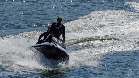 KOLOBRZEG, WEST POMERANIAN / POLAND - 2018: The water rescuer patrols sea shore