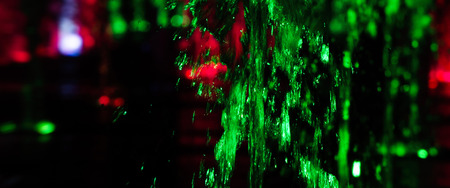 VOLCANO - Colorful fountain in the night city landscape