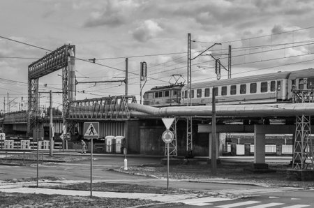 SZCZECIN, WEST POMERANIAN / POLAND - 2018: Express train on the viaduct in Szczecin