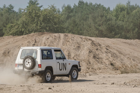 BORNE SULINOWO, WEST POMERANIAN / POLAND - 2018: Off-road vehicle marked with symbols of the United Nationsのeditorial素材