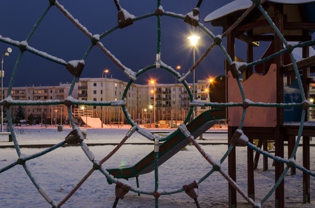 WINTER IN CITY - Snow-covered playground for children in Kolobrzegの写真素材