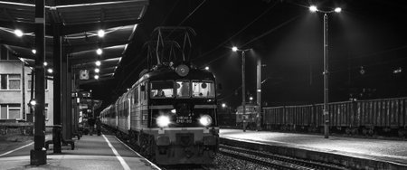 KOLOBRZEG, WEST POMERANIAN / POLAND - 2018: An express train at the railway stationのeditorial素材