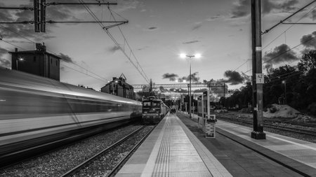KOLOBRZEG, WEST POMERANIAN / POLAND - 2018: An express train at the railway stationのeditorial素材