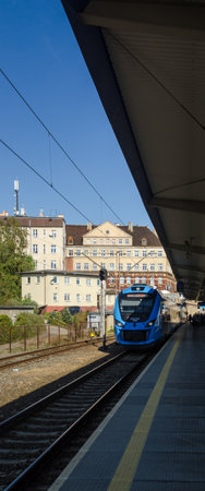 SZCZECIN, WEST POMERANIAN / POLAND - 2018: Modern passenger train are waiting for passengers on the platformのeditorial素材