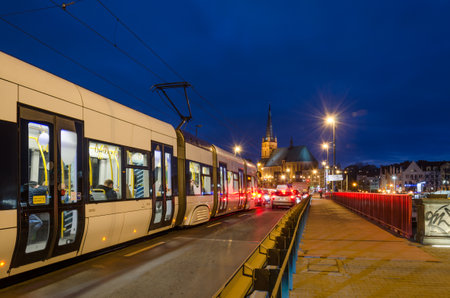 SZCZECIN, WEST POMERANIAN / POLAND - 2018: Tram on the bridge in the cityのeditorial素材