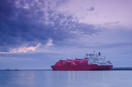 LNG TANKER - Ship at dawn moored to the gas terminal