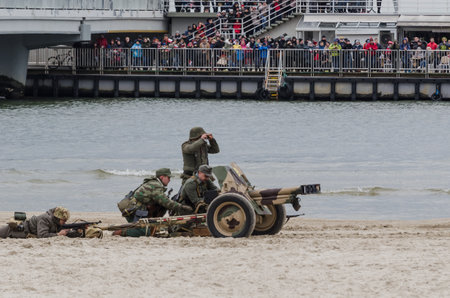 KOLOBRZEG, WEST POMERANIAN / POLAND - 2019: Reconstruction of battle for Kolobrzeg - German...
