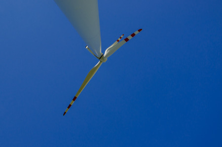 WIND TURBINE - Wind power station against the background of pure blue skyの写真素材
