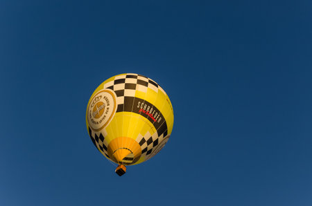 SZCZECINEK, WEST POMERANIAN / POLAND - 2019: Festival of balloon sport lovers - Flight of balloons on a blue skyのeditorial素材