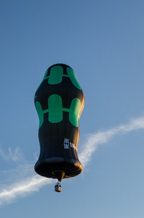 SZCZECINEK, WEST POMERANIAN / POLAND - 2019: Festival of balloon sport lovers - Flight of balloons on a blue skyのeditorial素材