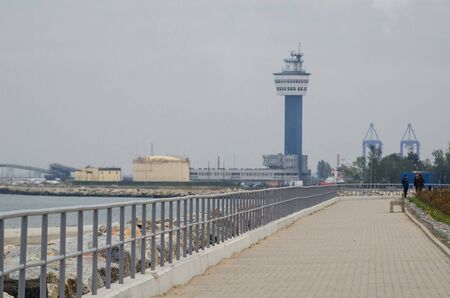 SEA COAST LANDSCAPE - Walking promenade on the background of seaport in Gdanskの写真素材