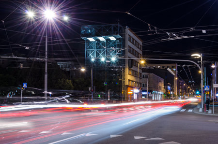 GDYNIA, POMERANIAN REGION / POLAND - 2019: Intersection of streets in the city center in night illuminationのeditorial素材