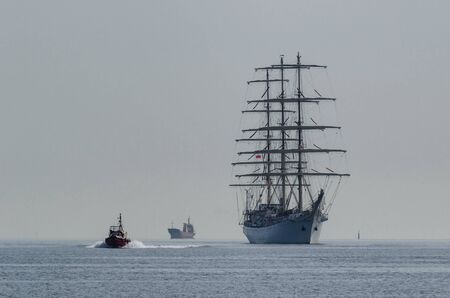 SHIPS AT SEA - Sailing vessel and motorboat on the waterway