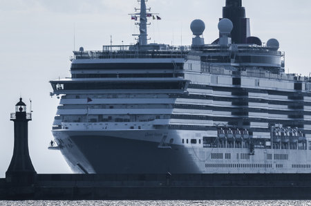 GDYNIA, POMERANIAN REGION / POLAND - 2019: Cruise ship QUEEN VICTORIA flows in to seaportのeditorial素材