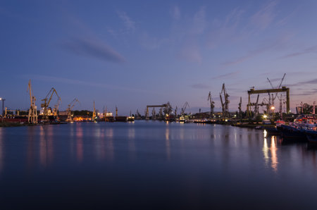 SZCZECIN, WEST POMERANIAN / POLAND - 2020: Docks, cranes, slipways and shipyard quaysのeditorial素材