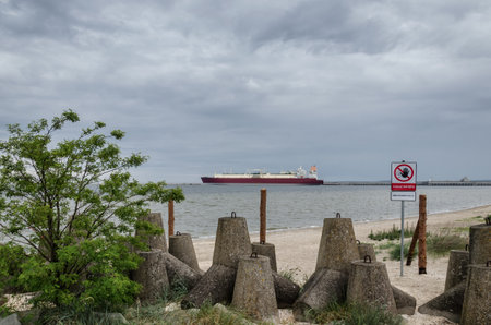 SWINOUJ?CIE, WEST POMERANIAN / POLAND - 2020: Sign informing about a ban on entering the LNG gas terminalのeditorial素材