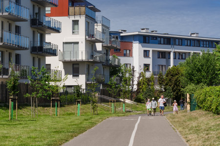 KOLOBRZEG, WEST POMERANIAN / POLAND - 2020: A modern and green housing estate on a warm sunny summer dayのeditorial素材