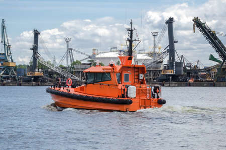 PILOT VESSEL - Fast motor boat in the portの写真素材