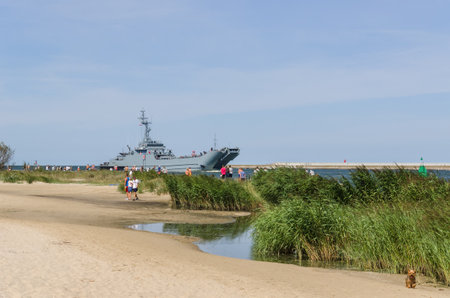 SWINOUJSCIE, WEST POMERANIAN / POLAND - 2020: A landing ship of the Polish Navy is going to the portのeditorial素材