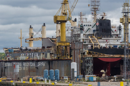 SZCZECIN, WEST POMERANIAN / POLAND - 2020: Ship under repair dock at the shipyard