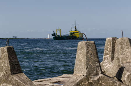 DOLOS - Geometric concrete blocks on the seashoreの写真素材