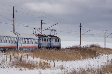 EXPRESS TRAIN - Locomotives with wagons on the winter trailの写真素材