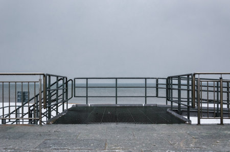 SEA COAST IN WINTER - Descent from promenade to beach is also accessible for the disabledの写真素材