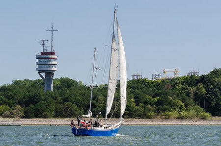 SWINOUJSCIE, WEST POMERANIAN - POLAND - 2020: Sailors on the yacht are going to the port