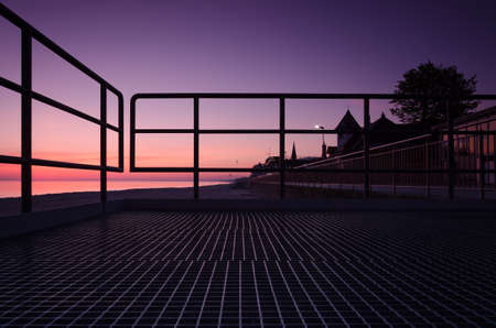 SUNRISE OVER THE SEASHORE - A colorful morning on the promenade
