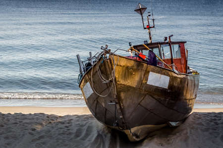 FISHING BOAT - Ship on the shoreline harborの写真素材