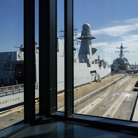 GDYNIA - POLAND - 2021: An Italian frigate and an American destroyer moored at a seaport wharfのeditorial素材