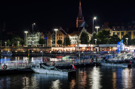 SZCZECIN, WEST POMERANIAN - POLAND - 2021: A military pontoon bridge connecting the banks of the river between the boulevardsのeditorial素材