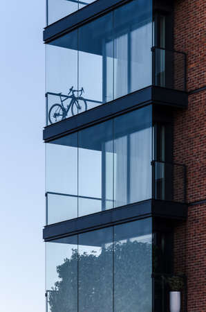 BIKE ON THE BALCONY - Landscapes of the modern cityの写真素材